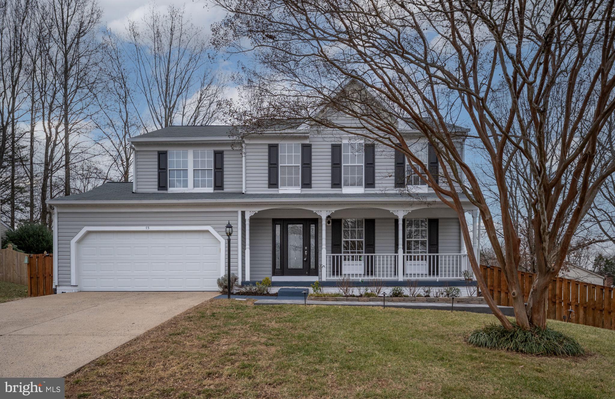73 Spring Lake Drive Stafford, VA 22556 - Photo 4 of 71 front view of a house with a yard