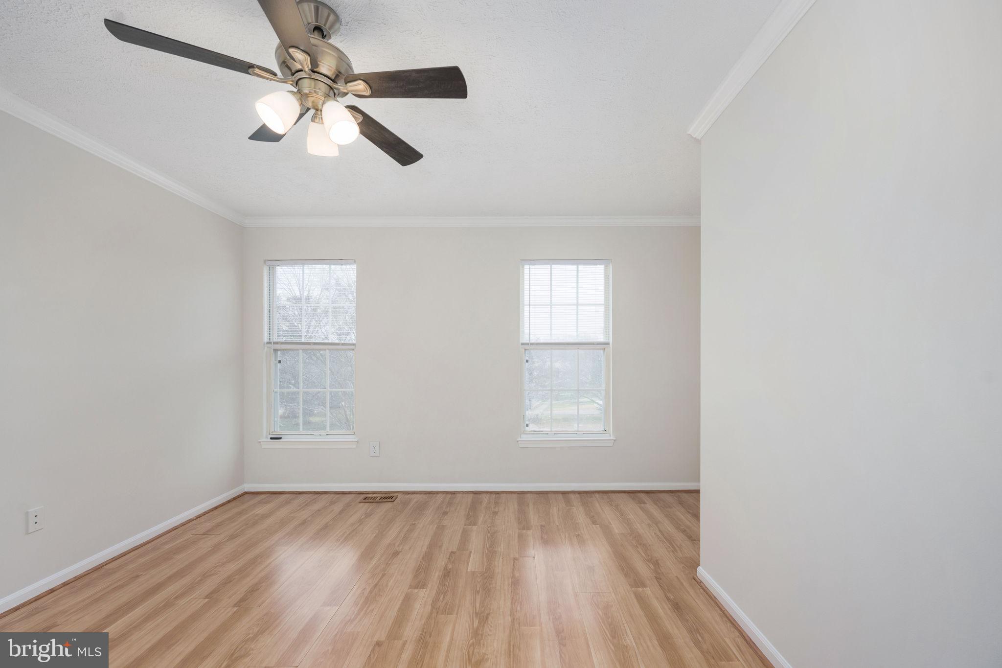 73 Spring Lake Drive Stafford, VA 22556 - Photo 42 of 71 an empty room with windows and fan