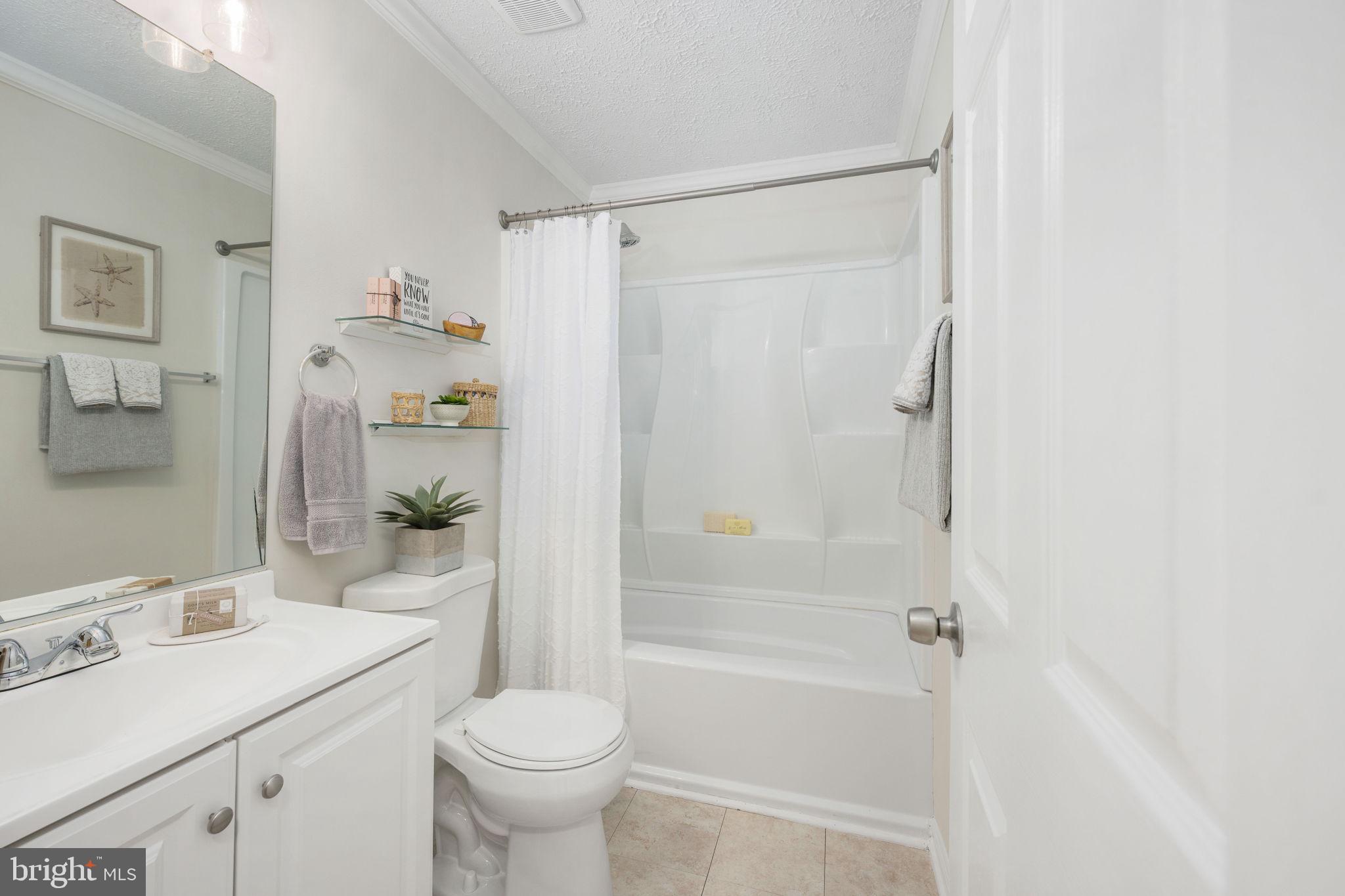 73 Spring Lake Drive Stafford, VA 22556 - Photo 45 of 71 a bathroom with a sink toilet and shower