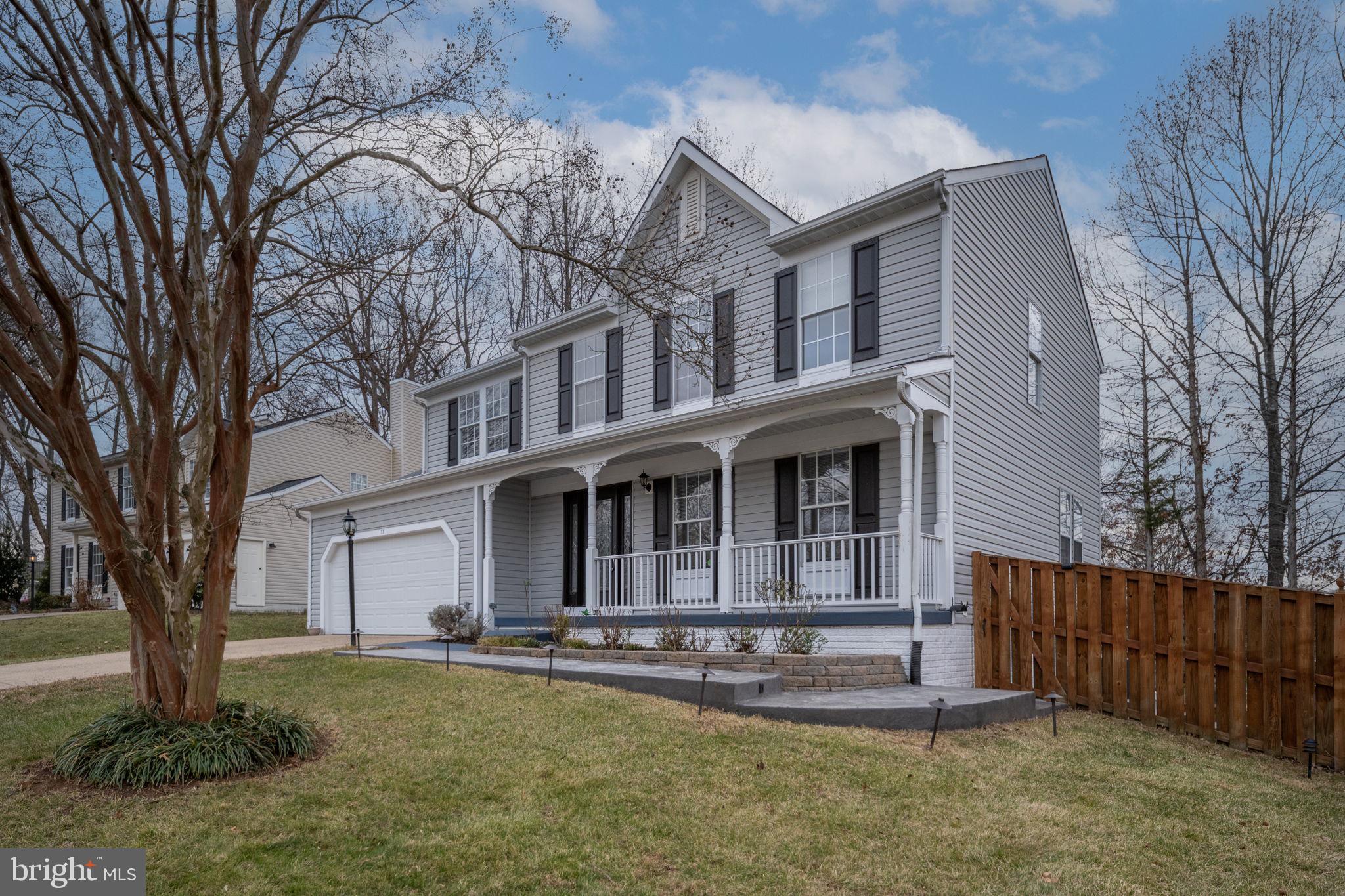 73 Spring Lake Drive Stafford, VA 22556 - Photo 5 of 71 a front view of a house with a yard