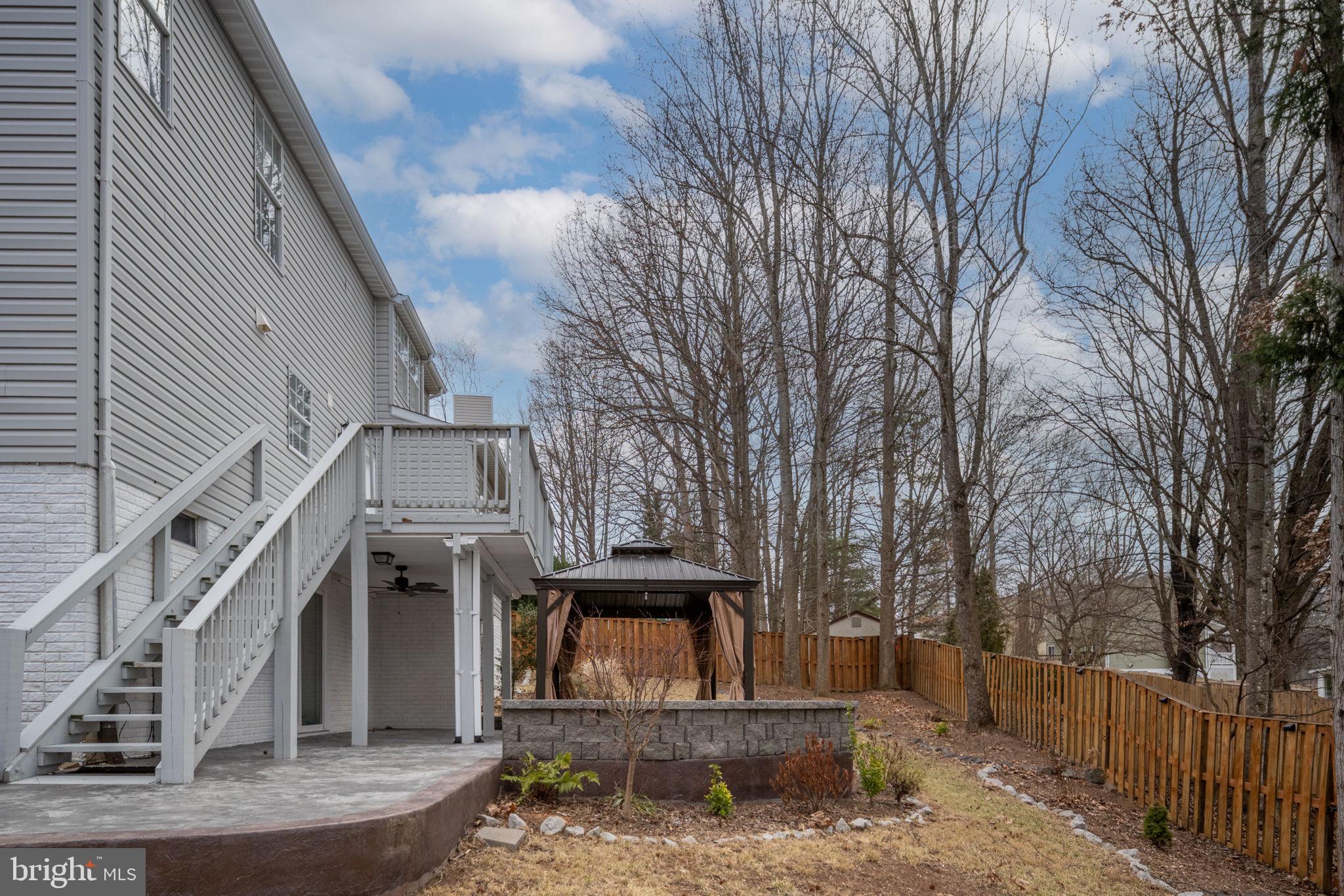 73 Spring Lake Drive Stafford, VA 22556 - Photo 59 of 71 a view of a house with a yard