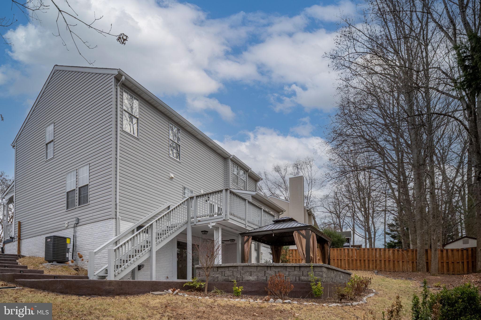 73 Spring Lake Drive Stafford, VA 22556 - Photo 60 of 71 a view of a house with a yard