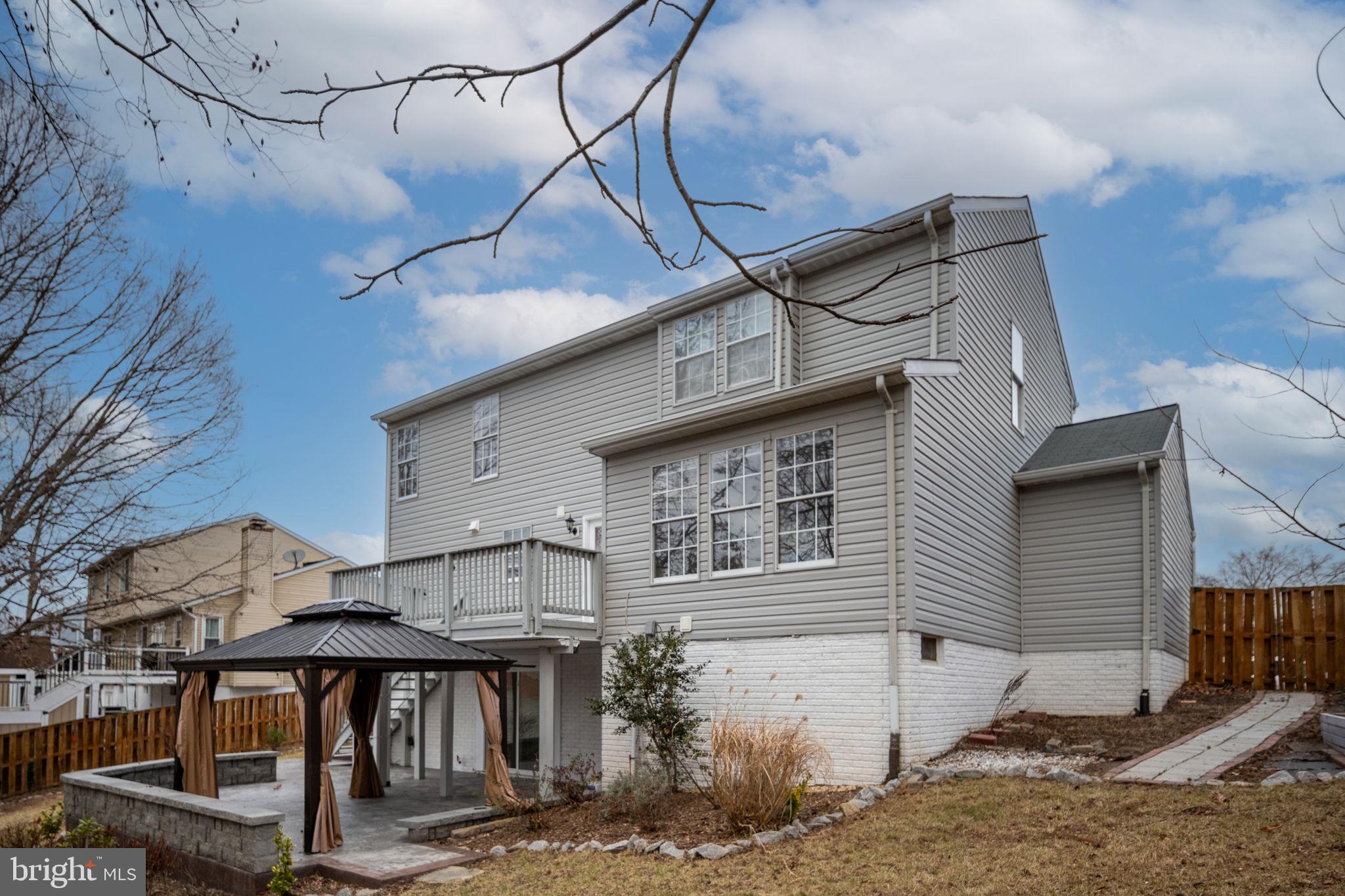 73 Spring Lake Drive Stafford, VA 22556 - Photo 62 of 71 a view of a house with a small yard and furniture