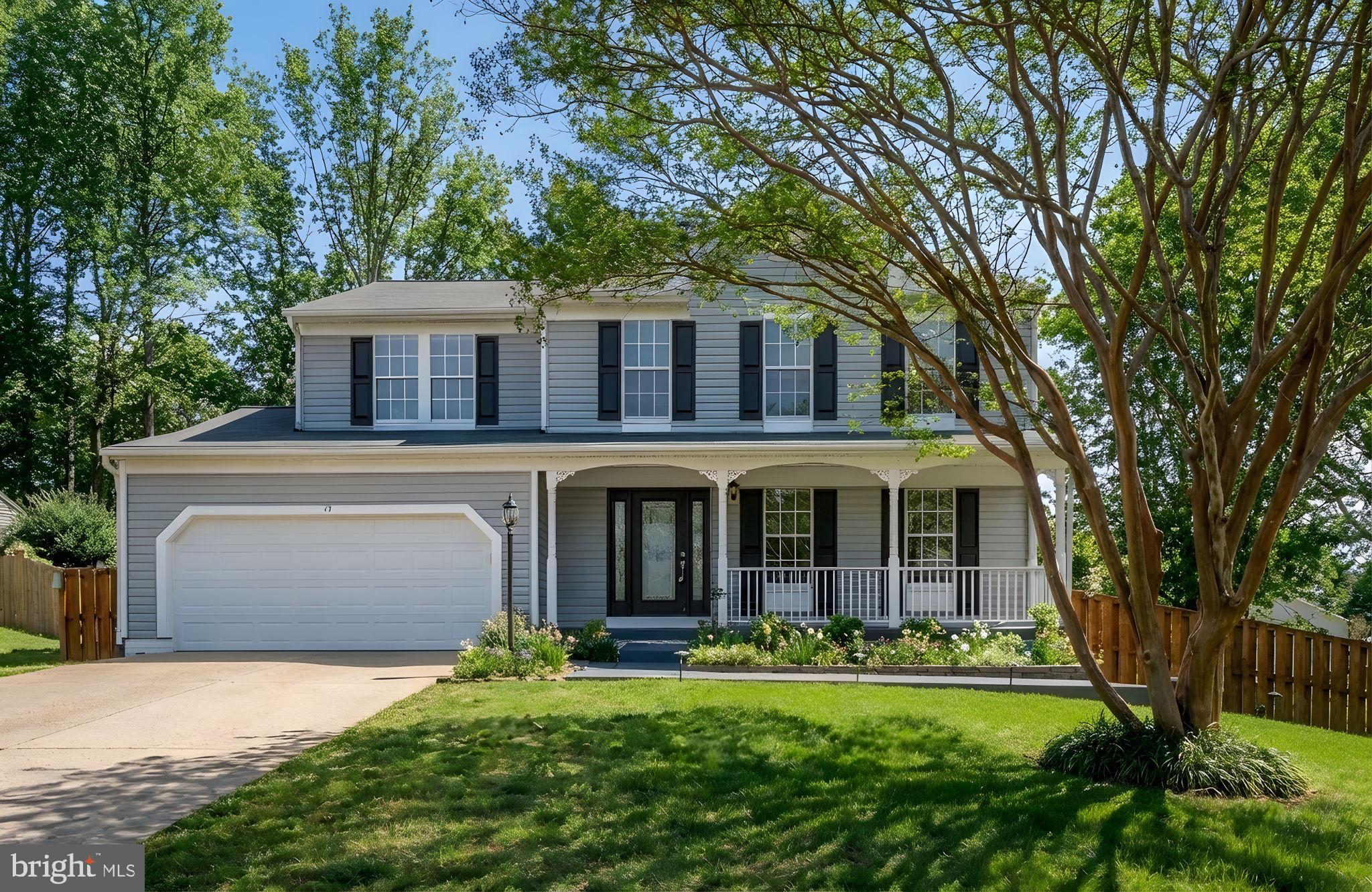 73 Spring Lake Drive Stafford, VA 22556 - Photo 7 of 71 front view of a house with a yard
