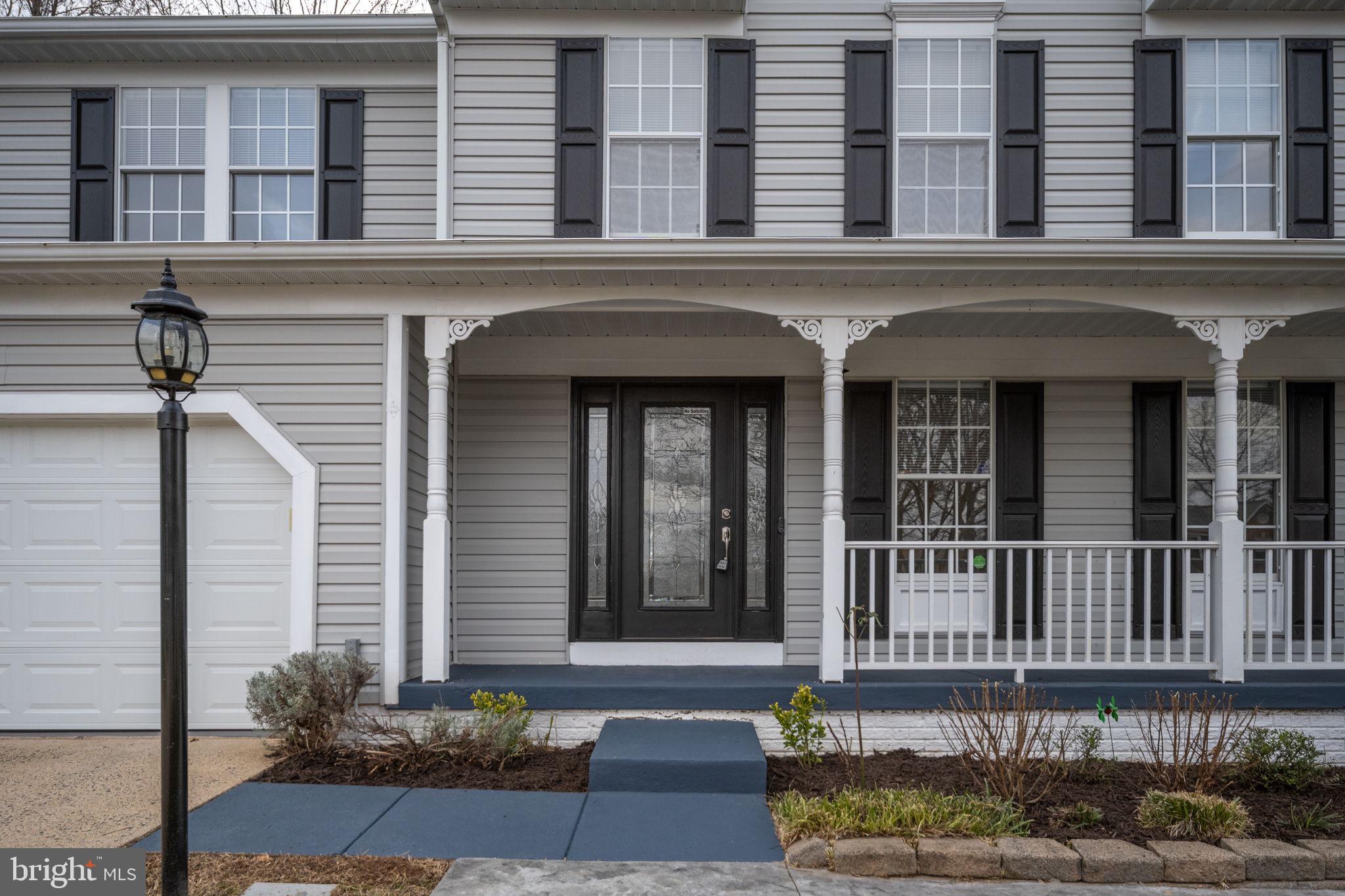 73 Spring Lake Drive Stafford, VA 22556 - Photo 8 of 71 a front view of a house with a yard