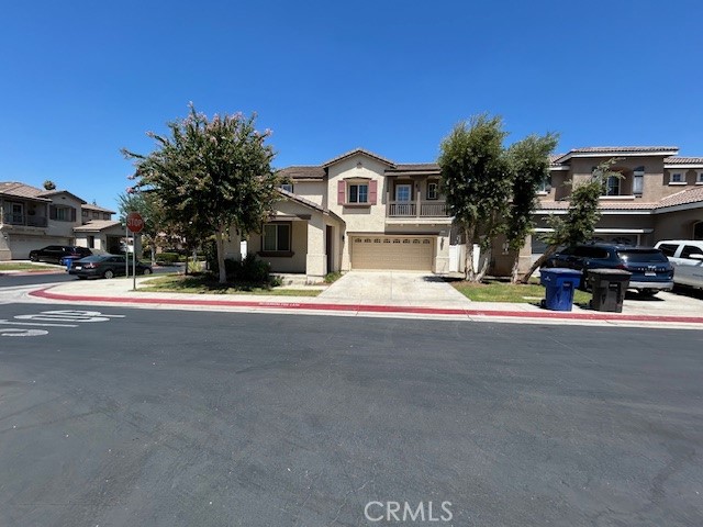 1911 Cefalu Court Riverside, CA 92507 - Photo 2 of 42 a view of a car park in front of a house