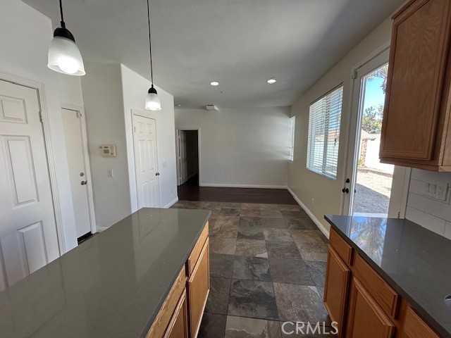 1911 Cefalu Court Riverside, CA 92507 - Photo 27 of 42 a view of hallway with window and wooden floor
