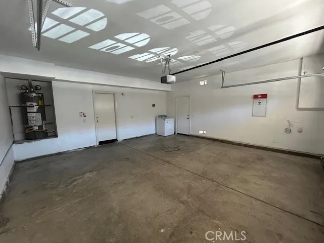 a view of balcony with wooden floor and seating space
