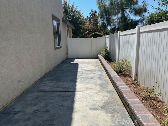 1911 Cefalu Court Riverside, CA 92507 - Photo 32 of 42 a view of a backyard with pathway