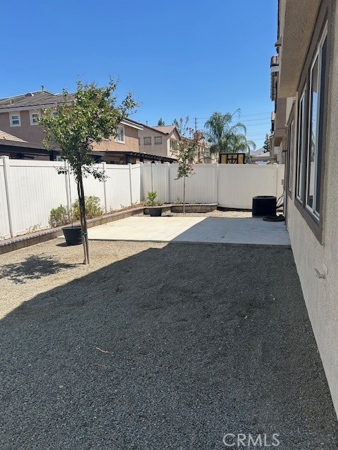1911 Cefalu Court Riverside, CA 92507 - Photo 33 of 42 a view of a house with a yard