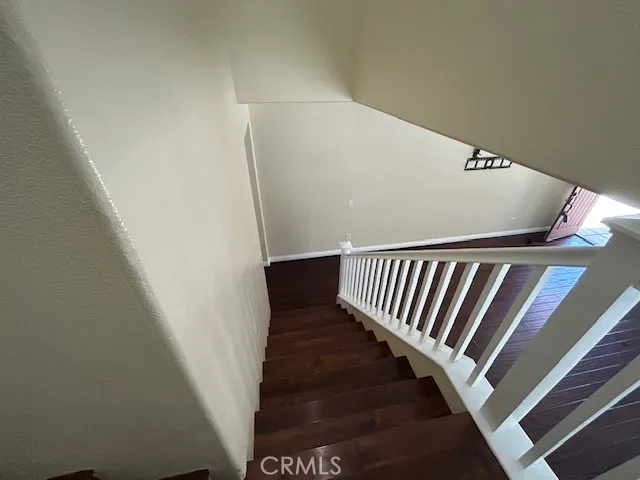 a view of a hallway with staircase