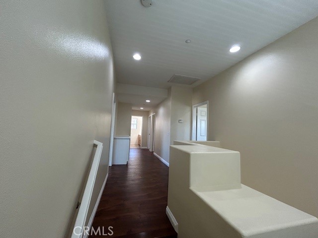 1911 Cefalu Court Riverside, CA 92507 - Photo 37 of 42 a view of a hallway with staircase