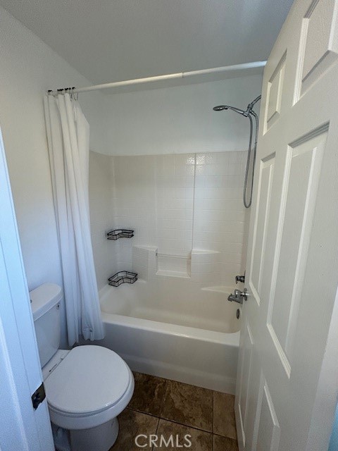 1911 Cefalu Court Riverside, CA 92507 - Photo 42 of 42 a bathroom with a toilet and a shower