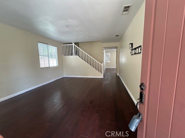 1911 Cefalu Court Riverside, CA 92507 - Photo 6 of 42 a view of entryway and hall with wooden floor