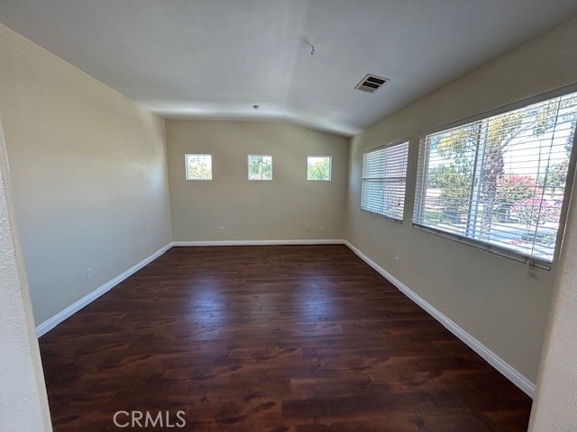 1911 Cefalu Court Riverside, CA 92507 - Photo 10 of 42 wooden floor in an empty room with a window