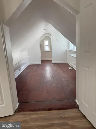 a view of livingroom and hardwood floor
