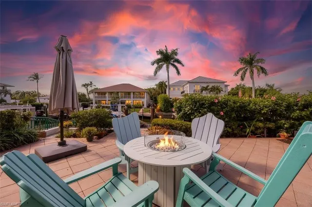 a view of a terrace with furniture and a potted plant