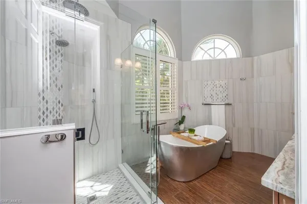 a room with wooden floor and window