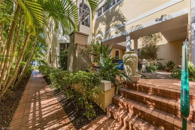 a view of path along with potted plants