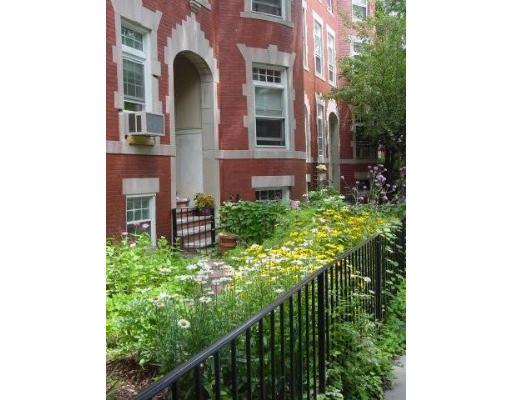 17 Strathmore Road, Unit THREE Brookline, MA 02445 - Photo 1 of 1 a view of a house with a small yard
