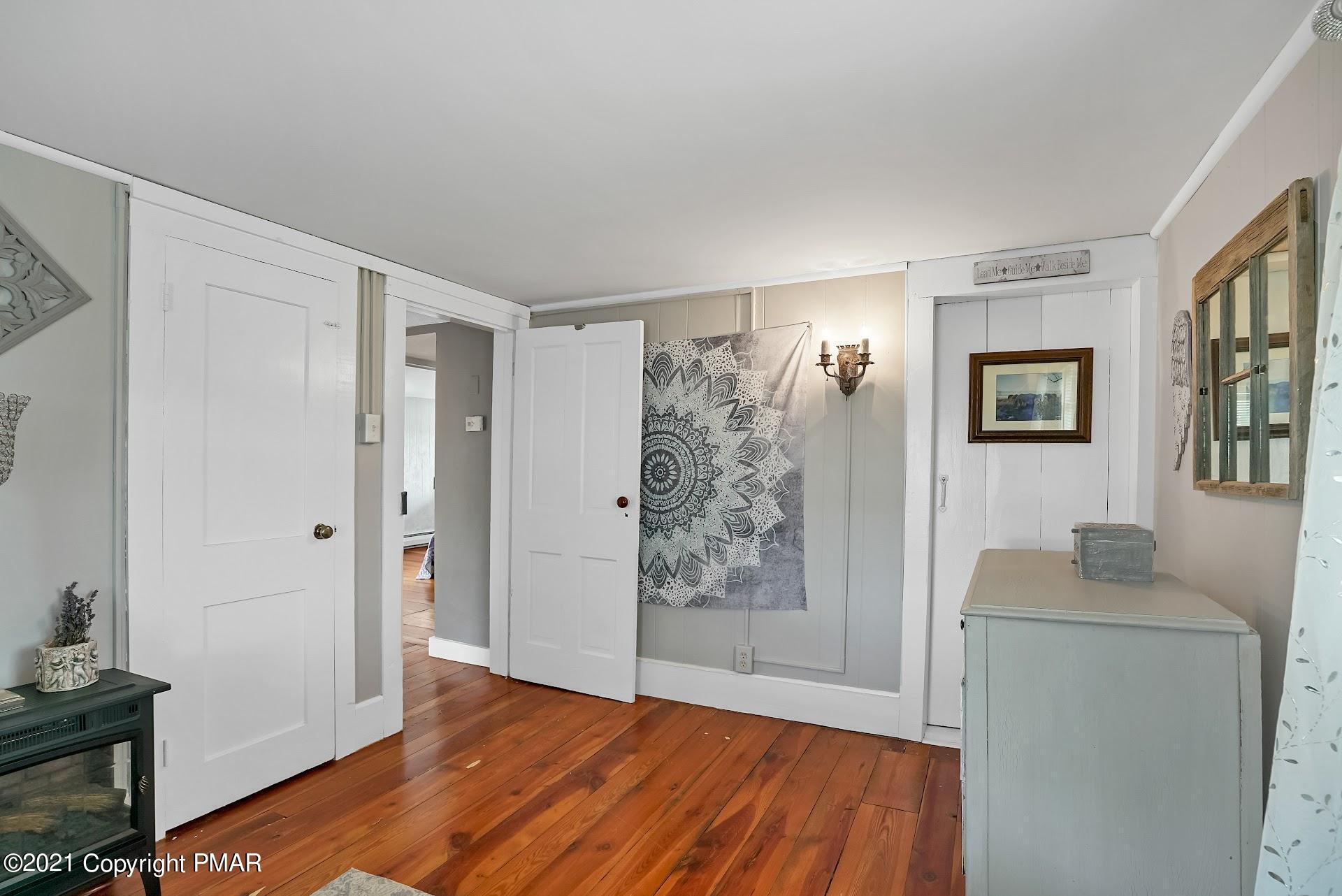 1186 Burger Hollow Road Effort, PA 18330 - Photo 23 of 35 a view of room with window and wooden floor