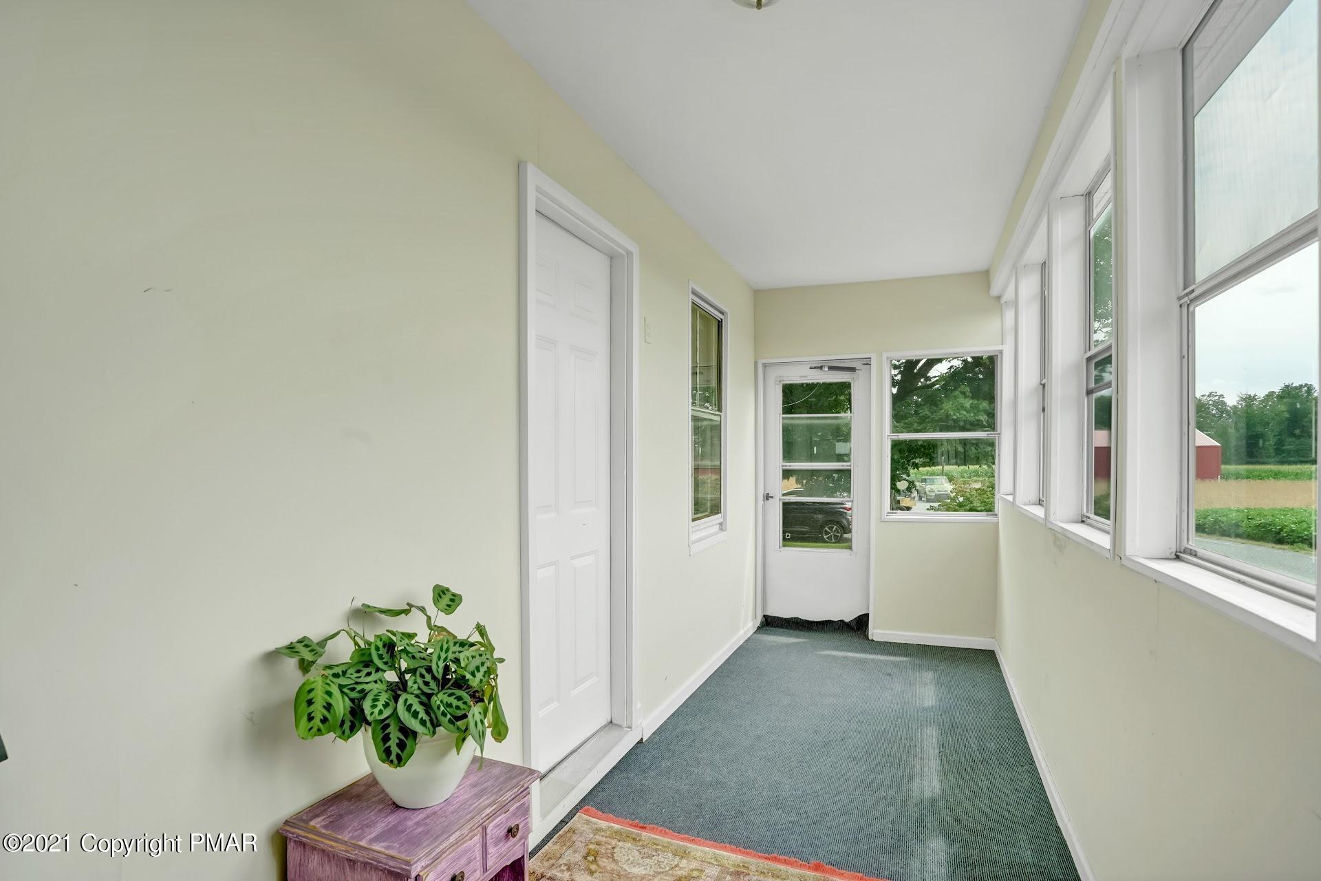 1186 Burger Hollow Road Effort, PA 18330 - Photo 24 of 35 a view of entryway with window and front door