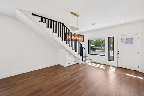 a view of entryway with wooden floor