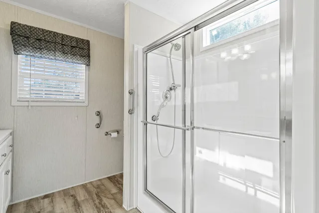 a bathroom with a toilet and a bathtub