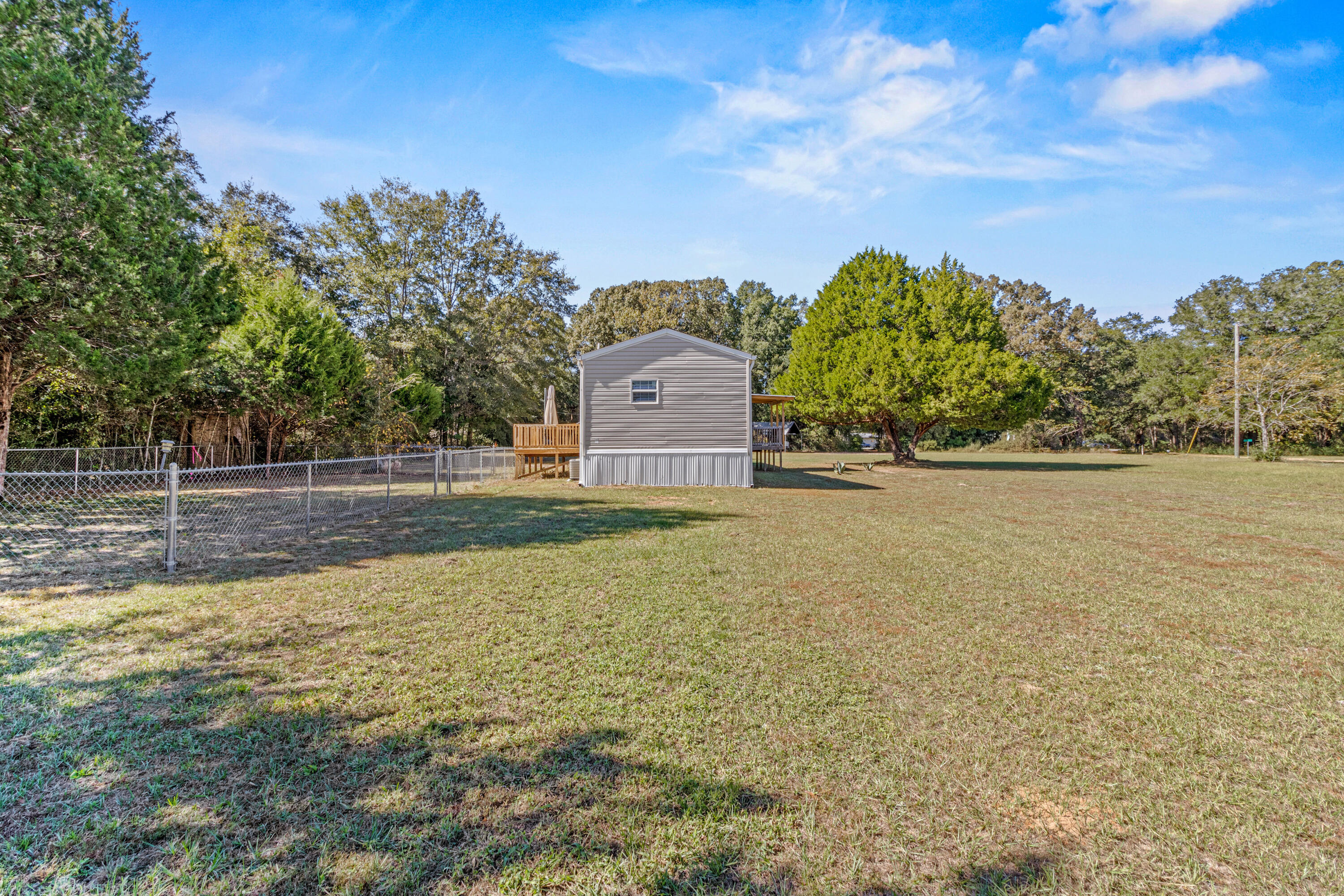 7419 Pappa Lawrence Road Laurel Hill, FL 32567 - Photo 6 of 40 a view of a large garden