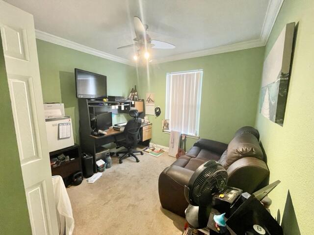 229 Limestone Circle Crestview, FL 32539 - Photo 13 of 22 a living room with furniture and a flat screen tv