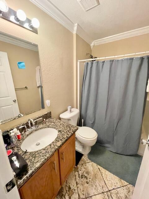 229 Limestone Circle Crestview, FL 32539 - Photo 14 of 22 a bathroom with a sink toilet and shower