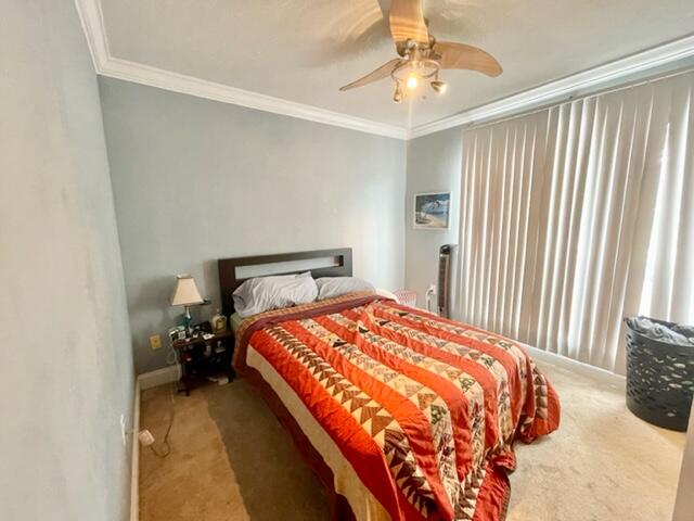 229 Limestone Circle Crestview, FL 32539 - Photo 15 of 22 a bedroom with a bed and a chandelier