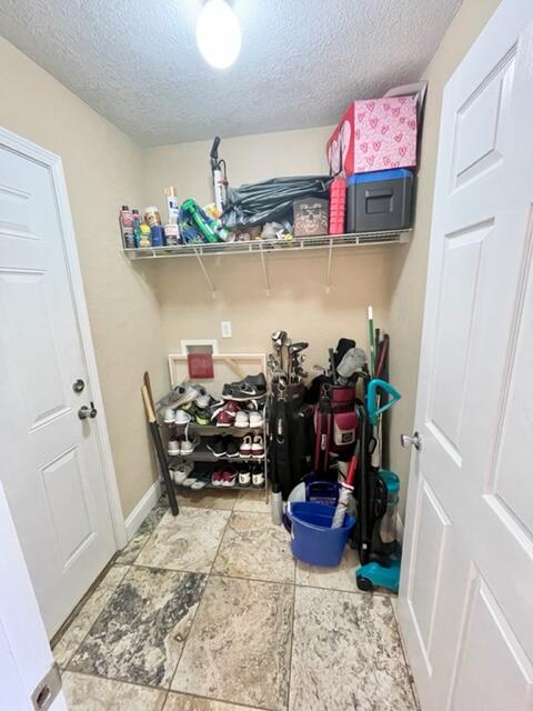 229 Limestone Circle Crestview, FL 32539 - Photo 16 of 22 a bed room with a bed and cabinets