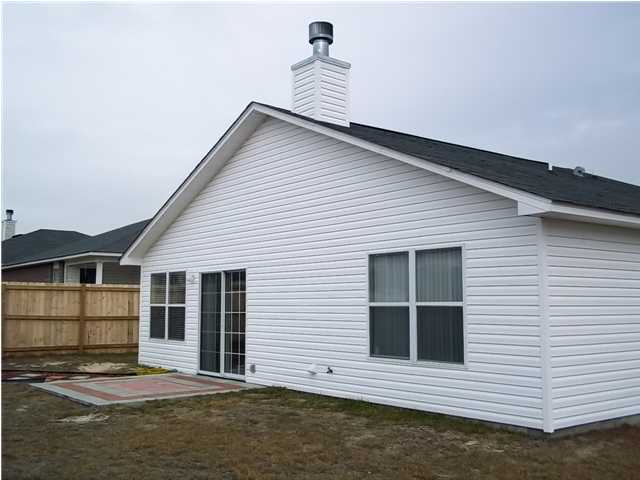 229 Limestone Circle Crestview, FL 32539 - Photo 17 of 22 a view of house with backyard