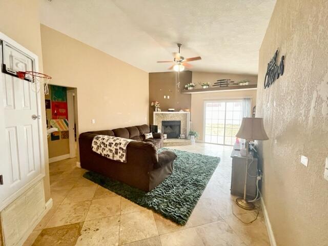 229 Limestone Circle Crestview, FL 32539 - Photo 6 of 22 a living room with couch and a large window