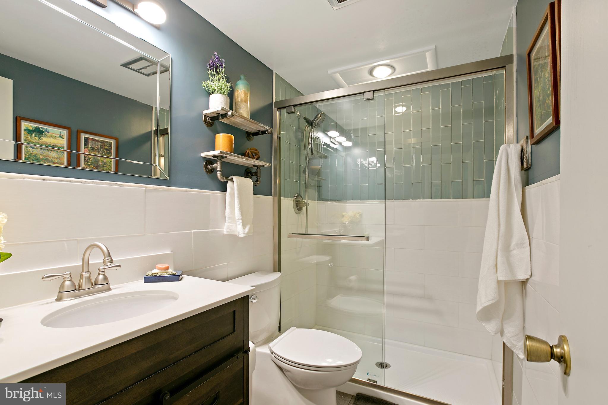 2 Cross Keys Road, Unit 2A Baltimore, MD 21210 - Photo 17 of 35 Renovated Hall bath