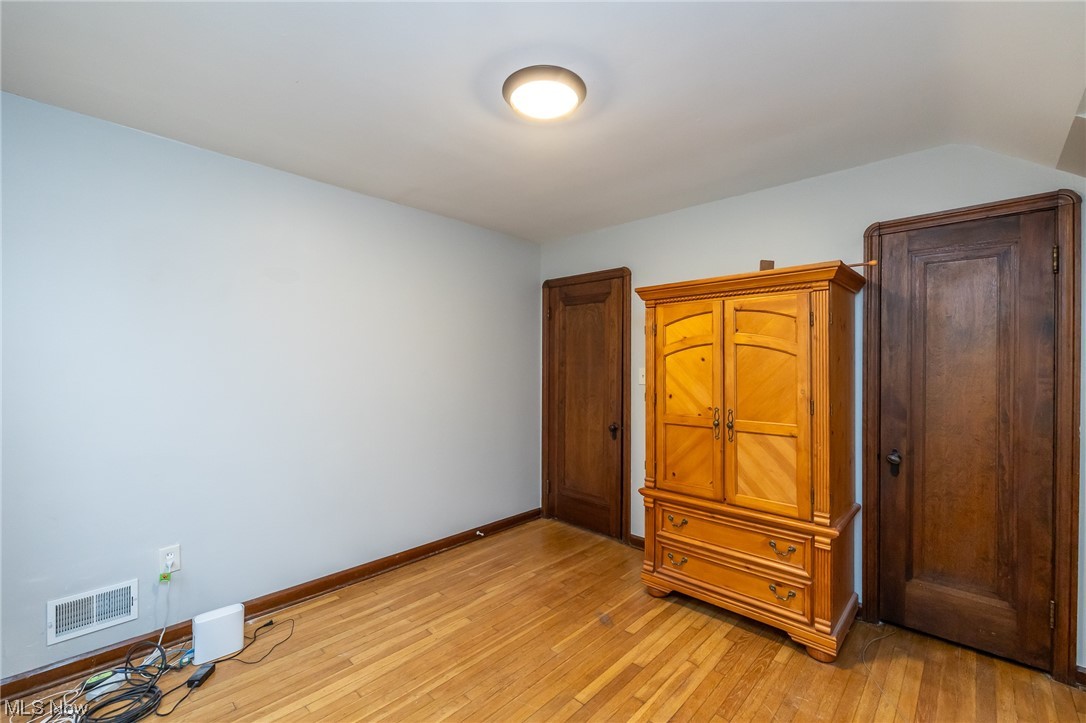 4668 Broadale Road Cleveland, OH 44109 - Photo 19 of 25 Unfurnished bedroom with light hardwood / wood-style flooring