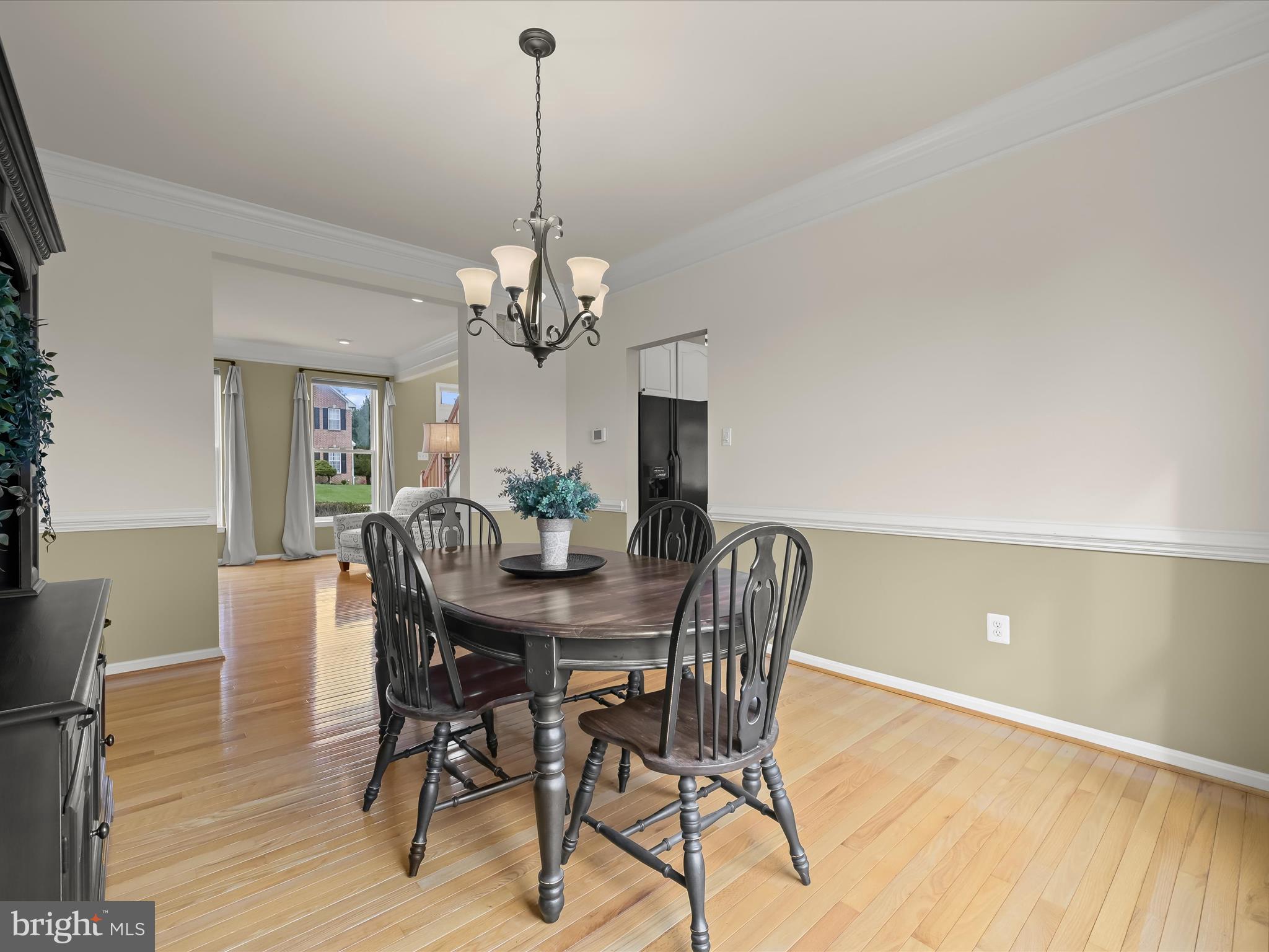7696 Swallow Road Sykesville, MD 21784 - Photo 12 of 143 Dining Room - Hardwood Floors - Classic Moldings