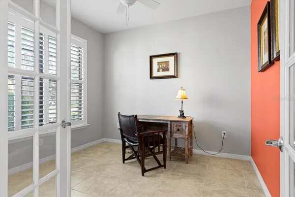 a view of a workspace with furniture
