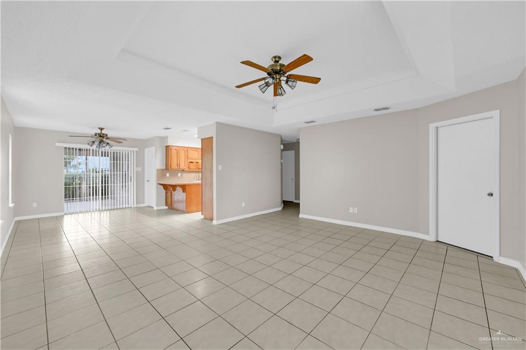 1702 Aries Street Mission, TX 78572 - Photo 4 of 19 a view of an empty room with a window