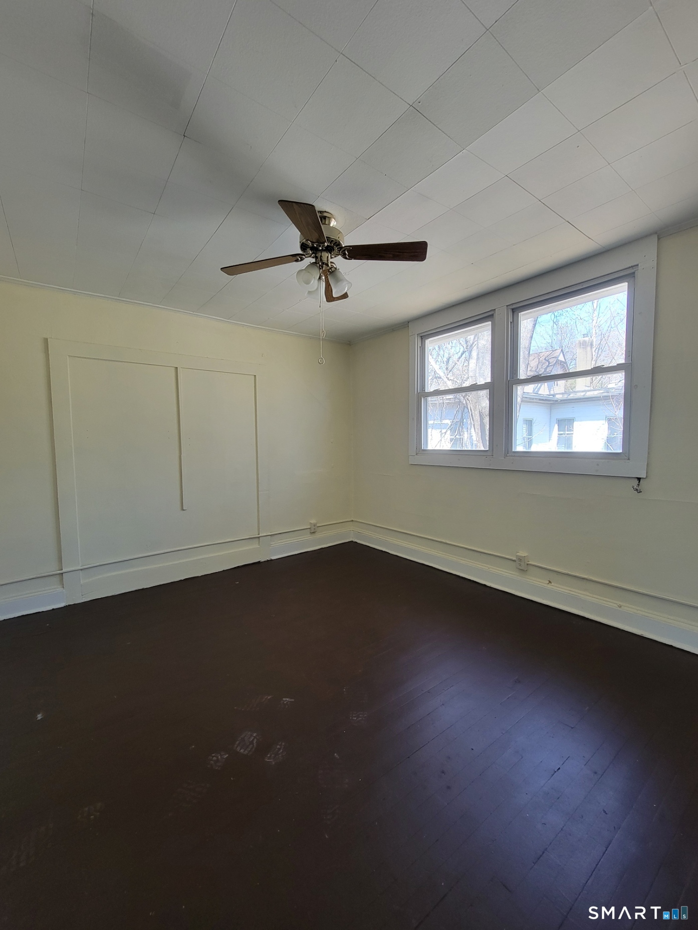 120 North Street, Unit 3 Windham, CT 06226 - Photo 2 of 11 a view of an empty room with a window and wooden floor