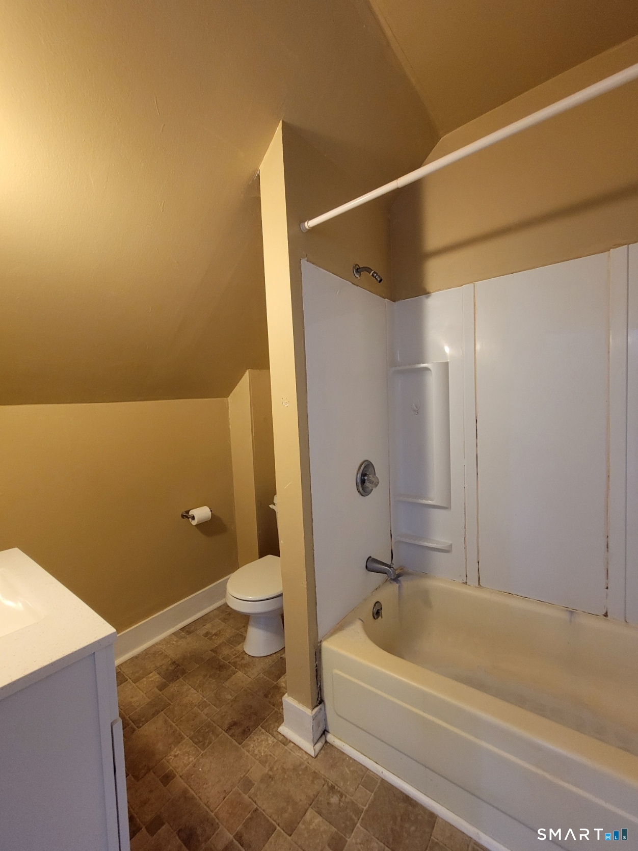 120 North Street, Unit 3 Windham, CT 06226 - Photo 7 of 11 a bathroom with a bathtub and a shower