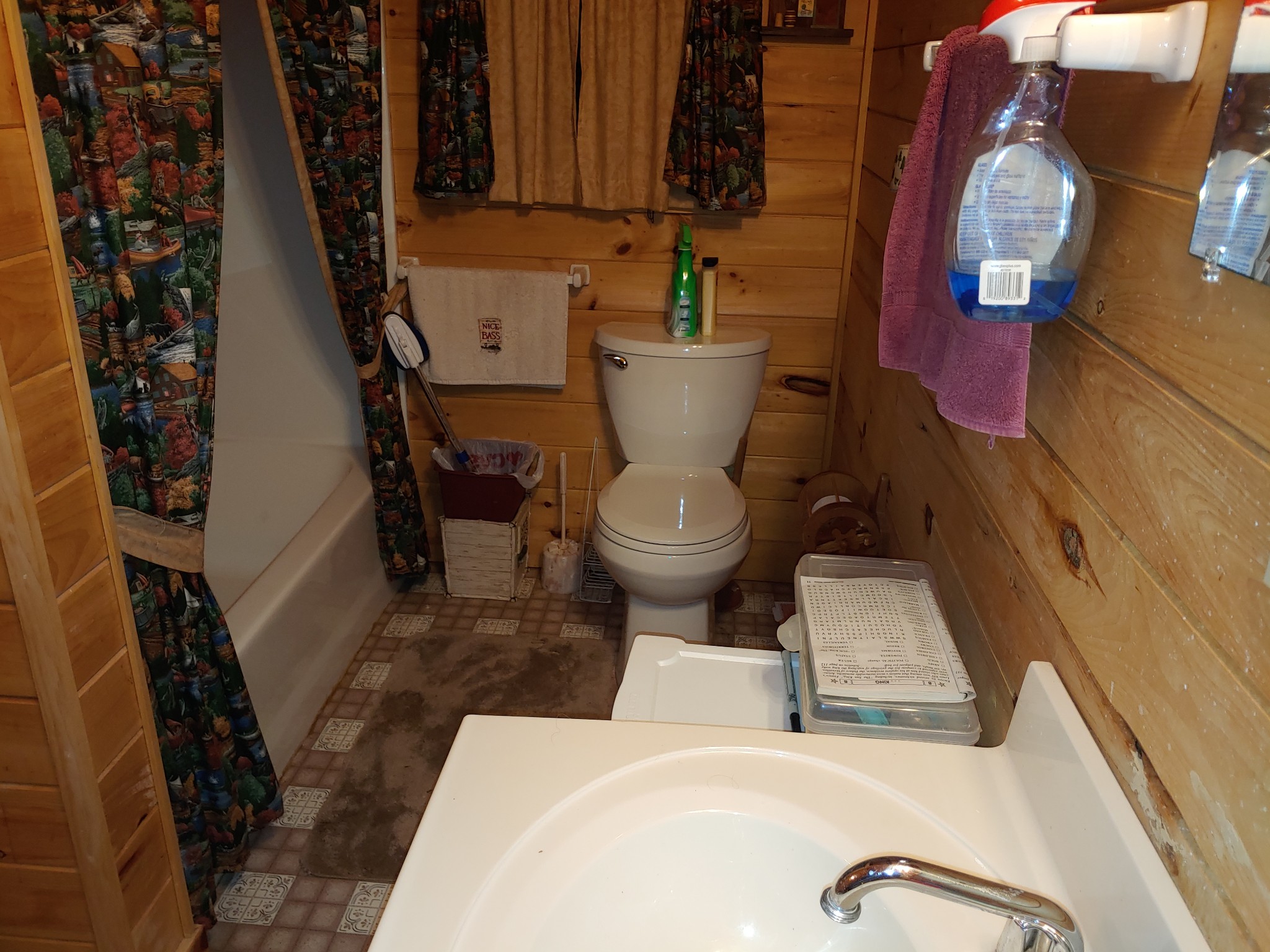 927 Lewis Branch Road Tennessee Ridge, TN 37178 - Photo 12 of 15 a bathroom with a toilet sink and mirror