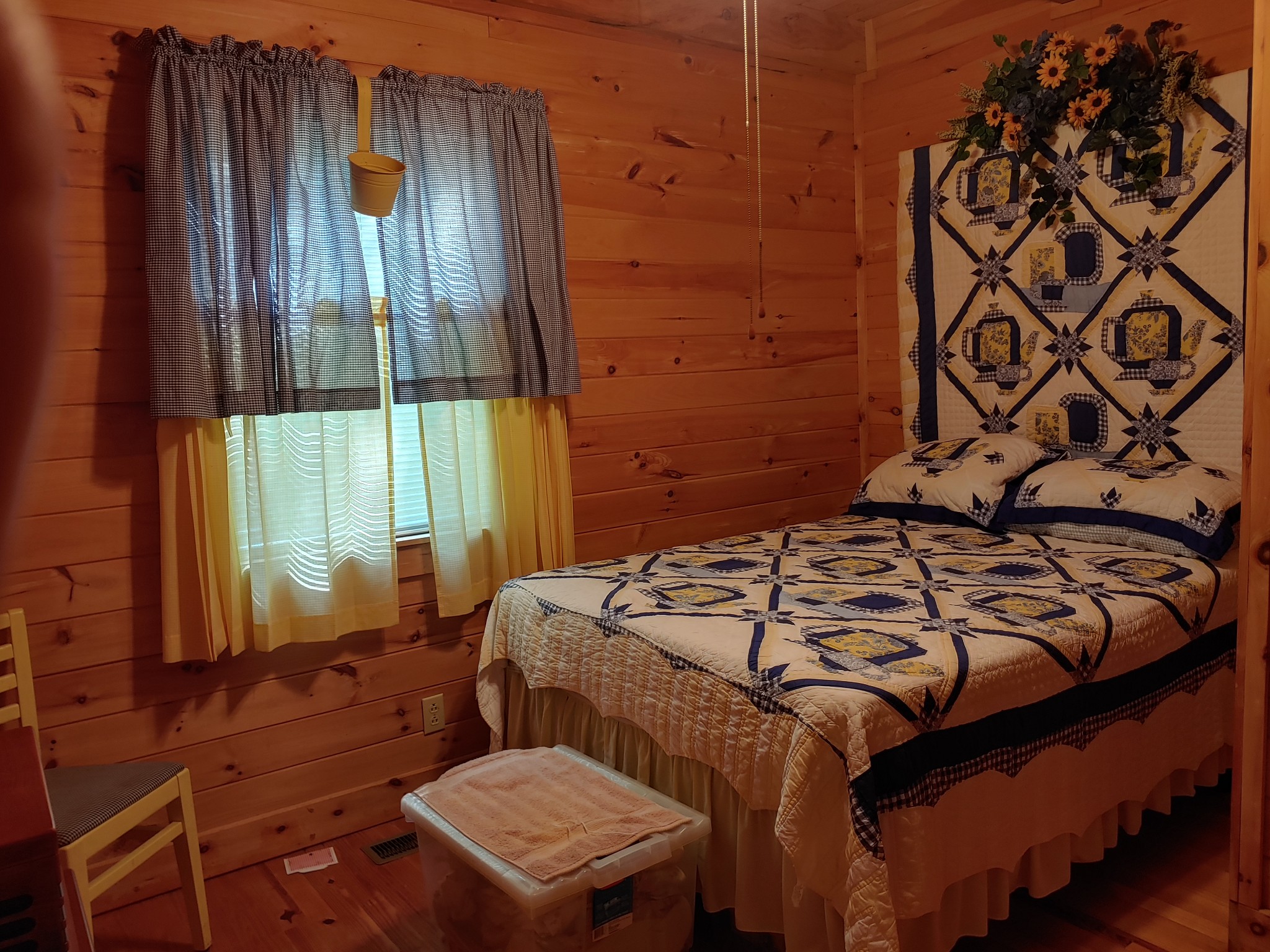 927 Lewis Branch Road Tennessee Ridge, TN 37178 - Photo 13 of 15 a bedroom with a bed and wooden floor