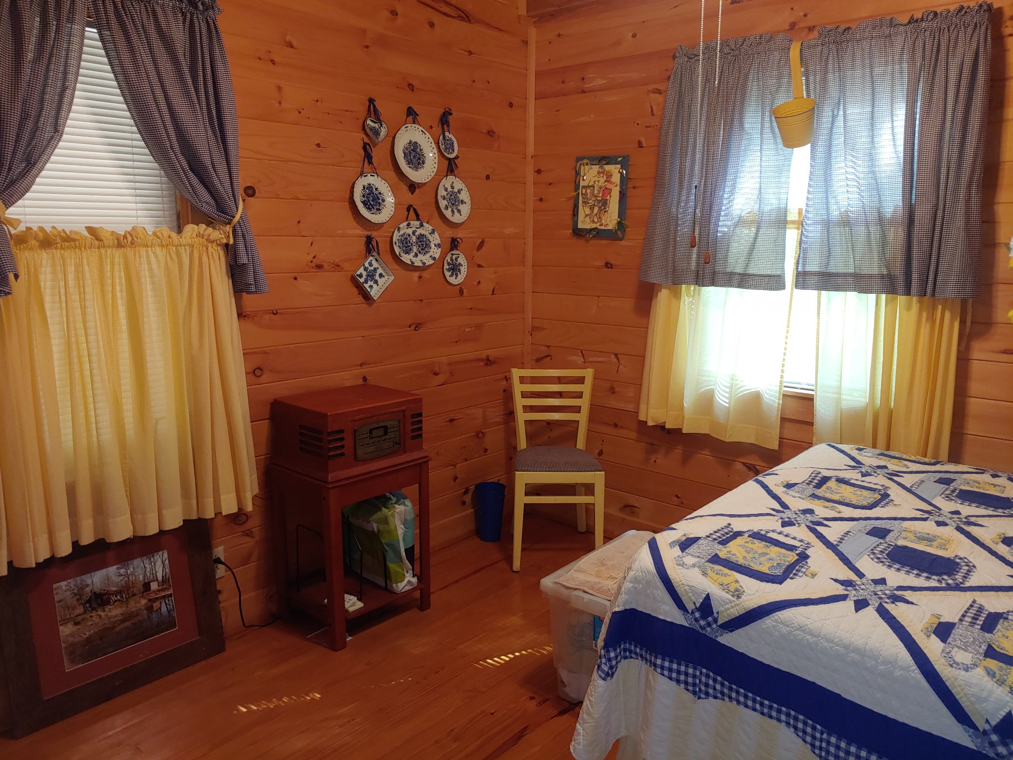 927 Lewis Branch Road Tennessee Ridge, TN 37178 - Photo 14 of 15 a bedroom with a bed and a fireplace