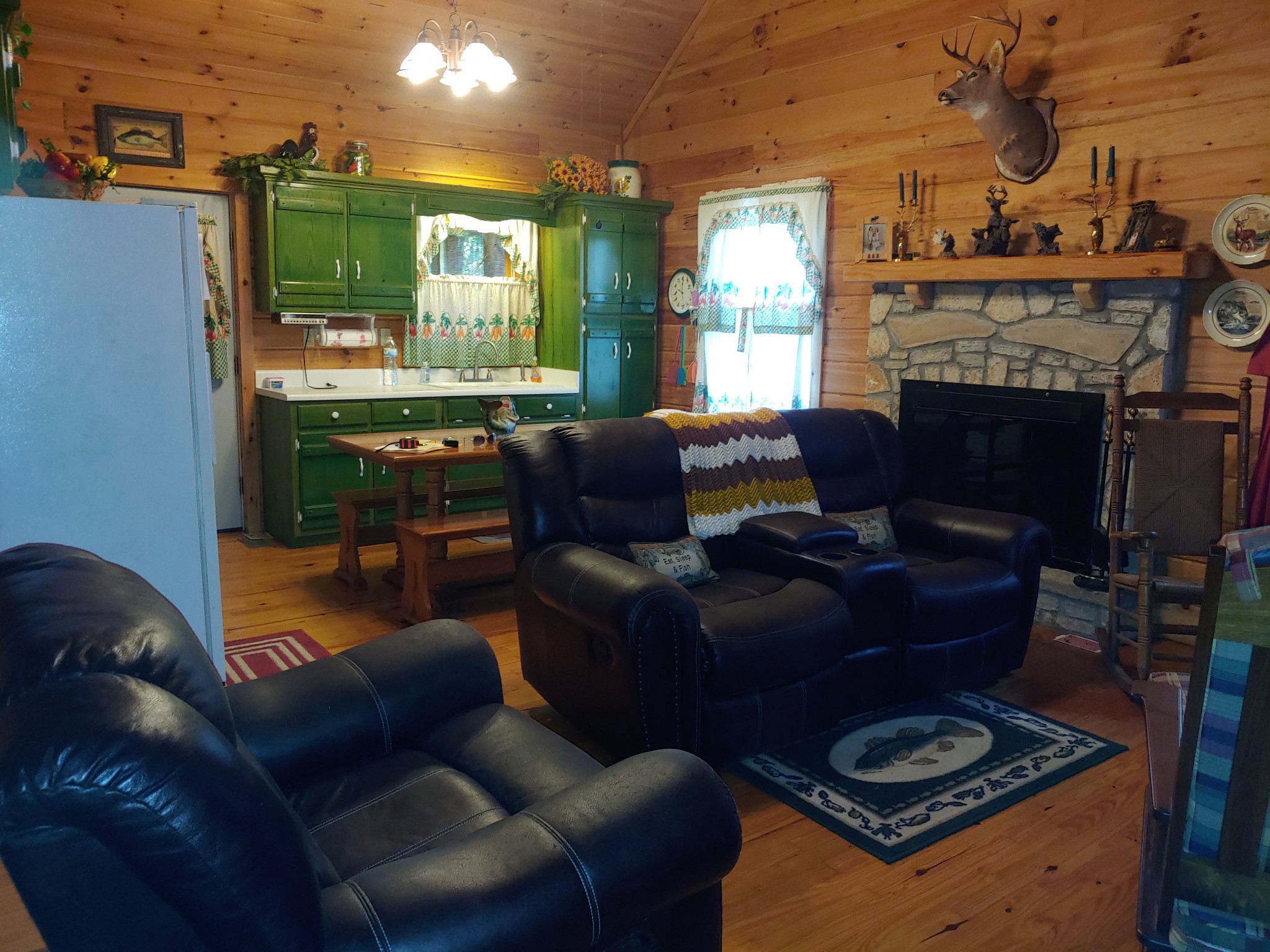 927 Lewis Branch Road Tennessee Ridge, TN 37178 - Photo 4 of 15 a living room with furniture a fireplace and a window