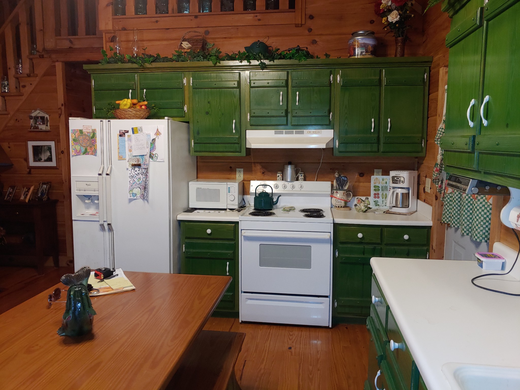 927 Lewis Branch Road Tennessee Ridge, TN 37178 - Photo 5 of 15 a room with a table and chairs
