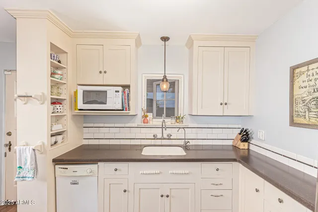 a view of livingroom with furniture and fireplace