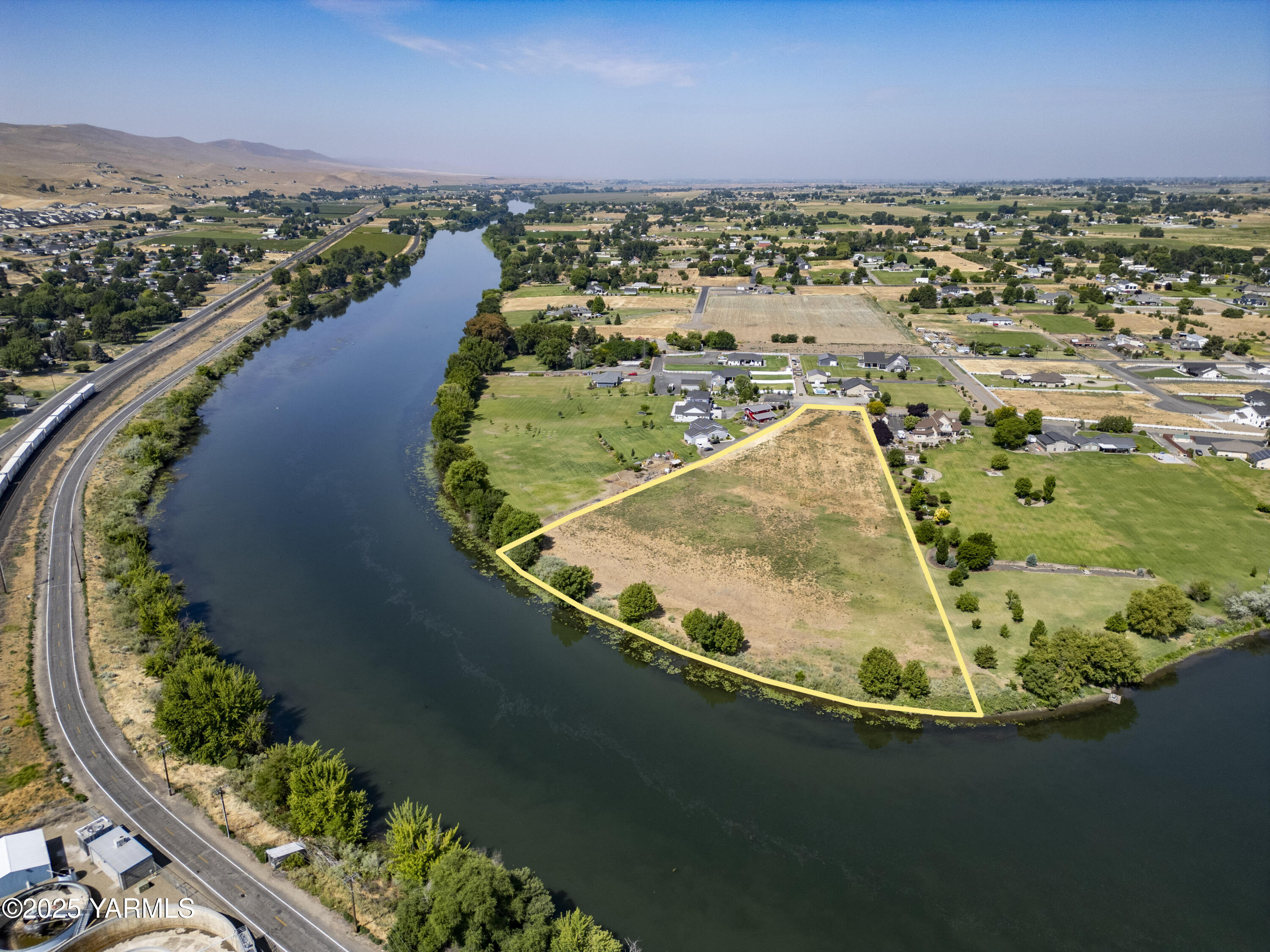 723 1366 Prairie South Prosser, WA 99350 - Photo 7 of 11 an aerial view of a house with a lake view