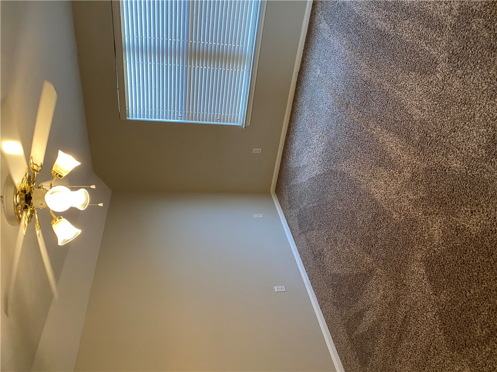 2429 Pintail Loop College Station, TX 77845 - Photo 11 of 20 a view of an empty room with a window